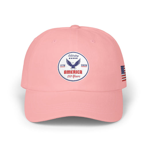 All pink classic ball cap with a circular emblem featuring an eagle and text , along with the American flag on the side on a white background.