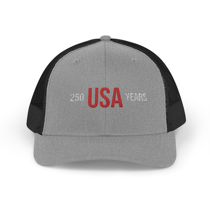 Black and grey trucker cap with 'USA 250 YEARS' text on a white background.
