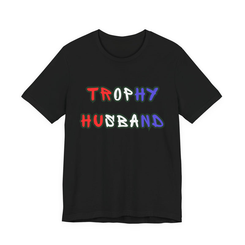 Black t-shirt with 'Trophy Husband' in red white and blue text on a white background