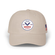 All beige classic ball cap with a circular emblem featuring an eagle and text , along with the American flag on the side on a white background.