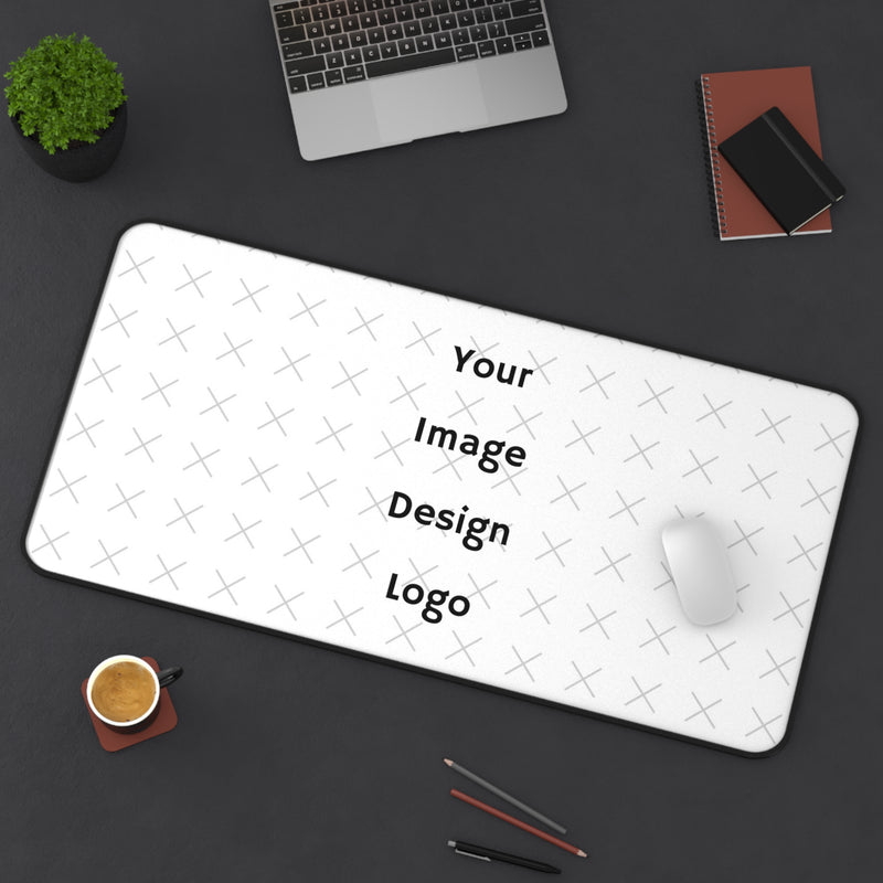 Customizable desk mat image with a "your image here" placeholder at an angle on desk with computer. 