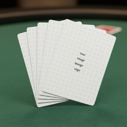 Customizable deck of playing cards fanned out on a poker table.