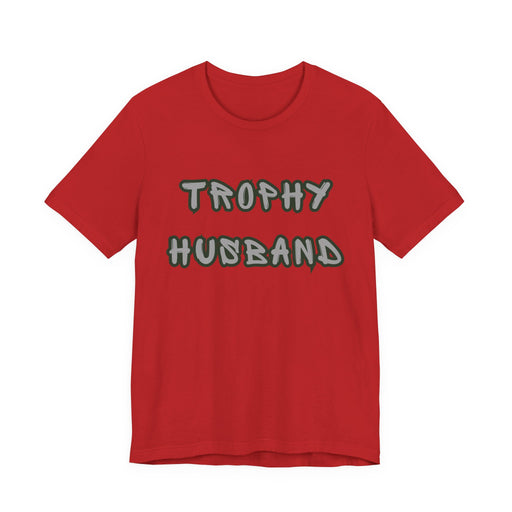 Red t-shirt with 'Trophy Husband' text on a white background