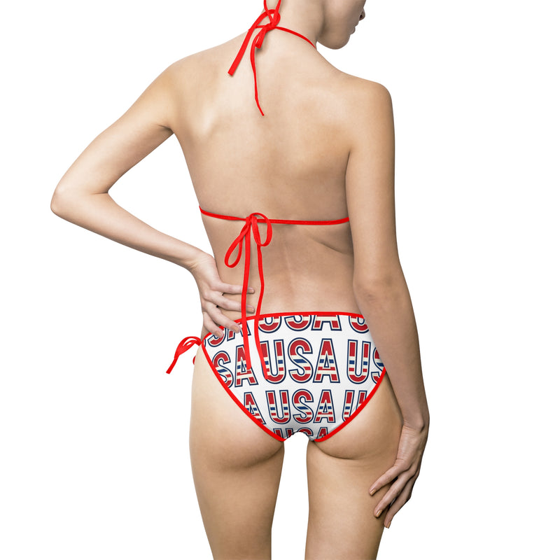 oman wearing a red, white, and blue 'USA' patterned bikini on a white background with red biking strings pictured from the back.