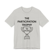 Light grey t-shirt with 'The Participation Trophy 1st Place' text and graphic on a white background