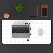 Customizable desk mat image with a "your image here" placeholder on desk with computer. 