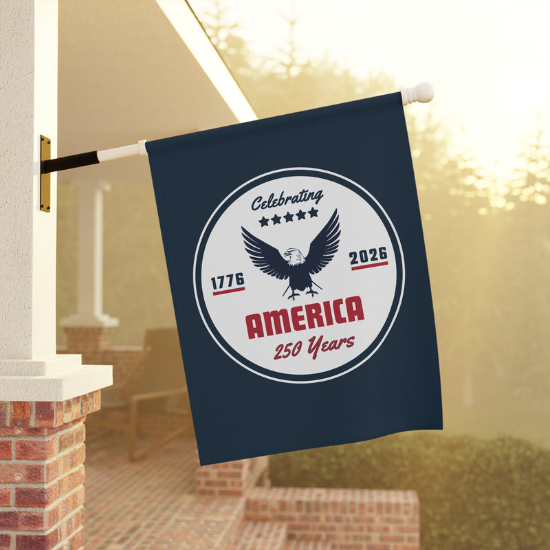 Decorative flag celebrating America's 250th anniversary hanging on a porch.