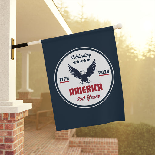 Decorative flag celebrating America's 250th anniversary hanging on a porch.