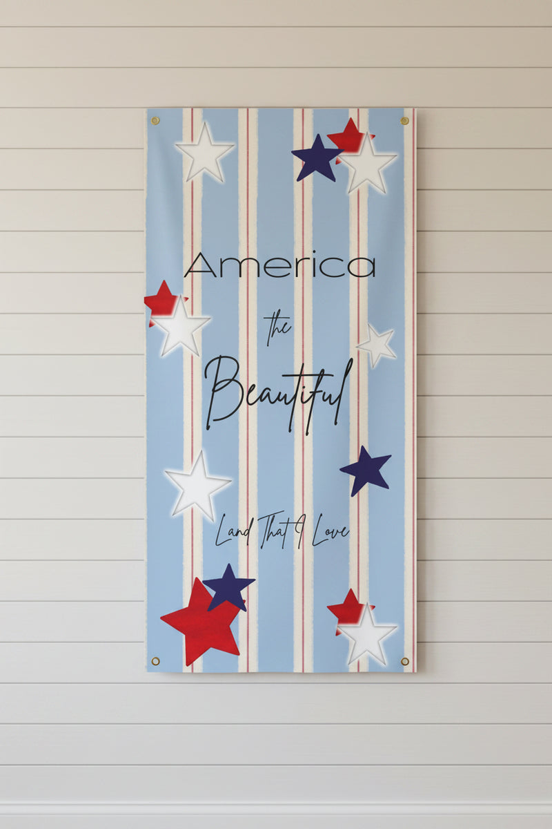 Vertical patriotic matte banner 24x48 and 36x72 inches with strips and red white and blue stars on a shiplap wall.
