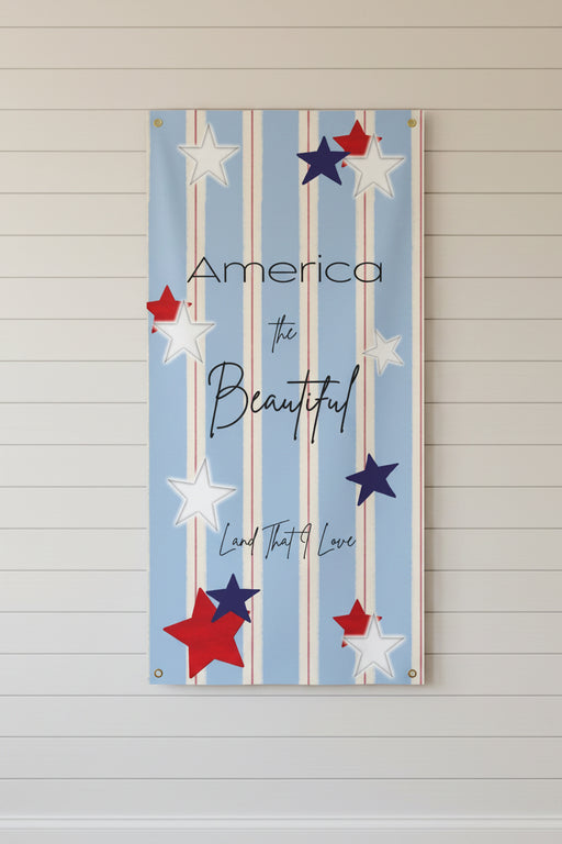 Vertical patriotic matte banner 24x48 and 36x72 inches with strips and red white and blue stars on a shiplap wall.

