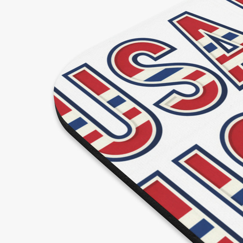 Close-up of a USA-themed mouse pad corner with red, white, and blue colors on a white background.