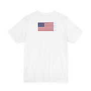 Back of a white t-shirt with an American flag patch on a white background