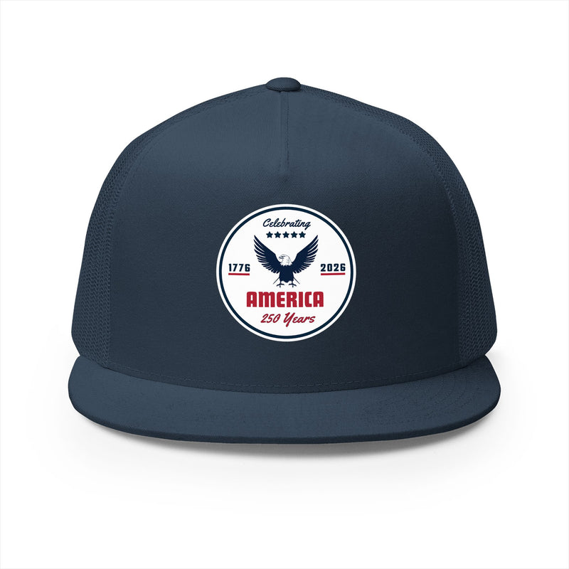 All navy blue flat bill trucker cap with a logo 'celebrating America 250 years' on a white background.