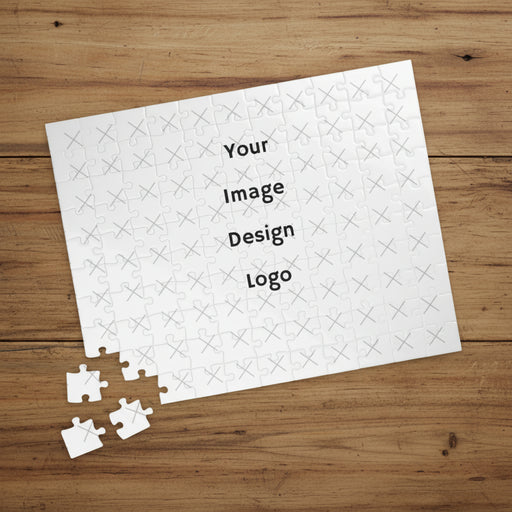 A customizable puzzle that has been put together and it marked by a "Your Image, Design or Logo here" image with the corner pieces pulled off on a wooden card table.