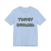 Light blue t-shirt with 'Trophy Husband' text on a white background