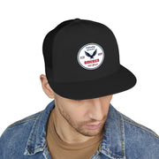 Man wearing an all black flat bill trucker cap with a logo 'celebrating America 250 years' on a white background.