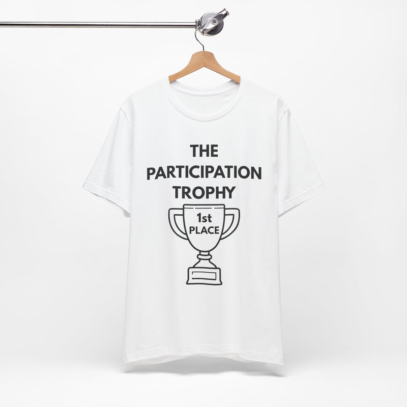 White t-shirt with 'The Participation Trophy 1st Place' text and graphic on a white background