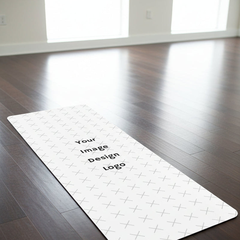 Customizable yoga mat with a "your image or design" placeholder on a yoa studio floor. 