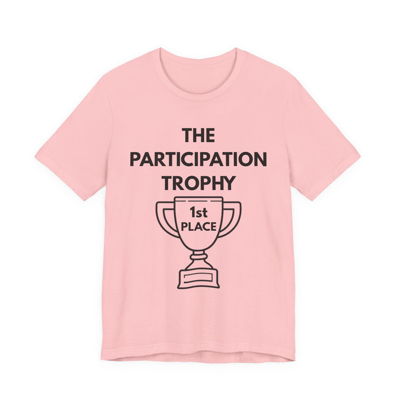 Pink t-shirt with 'The Participation Trophy 1st Place' text and graphic on a white background