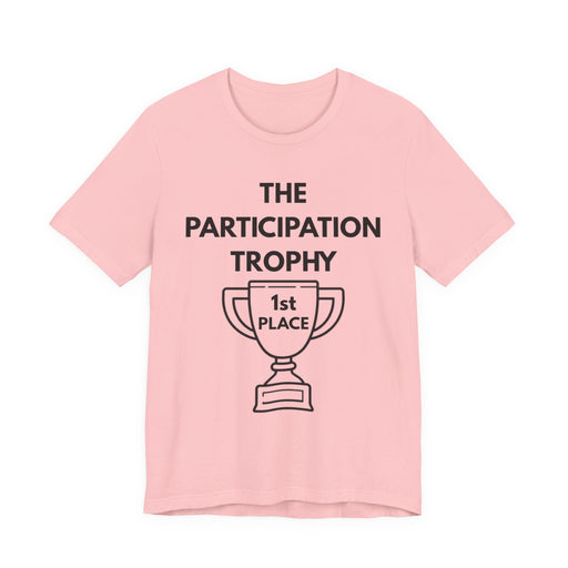 Pink t-shirt with 'The Participation Trophy 1st Place' text and graphic on a white background