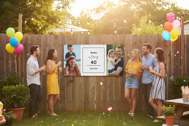 Custom vinyl photo banner with two family photos and center panel for name, age, and date hanging above a party table, 48x24 and 72x36 inches on wood fence.