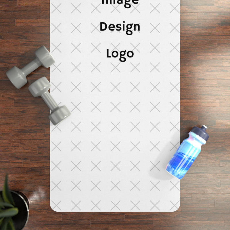 Customizable yoga mat with a "your image or design" placeholder with weights and a water bottle on a wooden floor.
