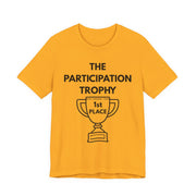 Gold t-shirt with 'The Participation Trophy 1st Place' text and graphic on a white background