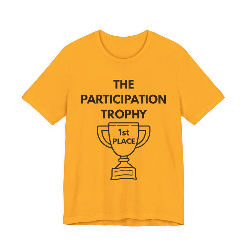 Gold t-shirt with 'The Participation Trophy 1st Place' text and graphic on a white background
