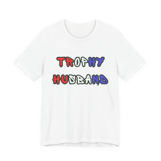 White t-shirt with 'Trophy Husband' in red white and blue text on a white background