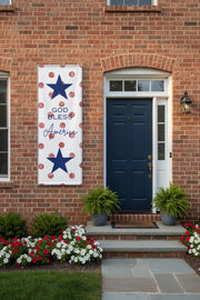 Patriotic “God Bless America” vertical matte banner with red polka dot background, 36x96 inches on front of house.  