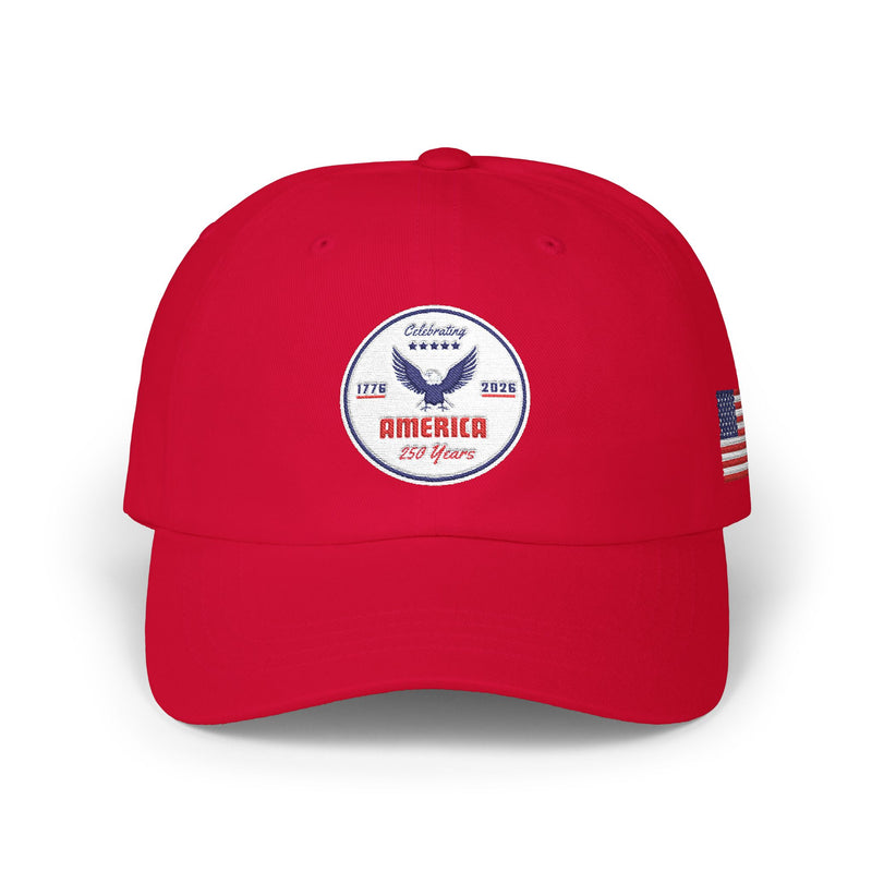All red classic ball cap with a circular emblem featuring an eagle and text , along with the American flag on the side on a white background.