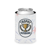 Can cooler with a can inside that has a 'Trophy Husband' design on a faded red white and blue firework display on a white background.
