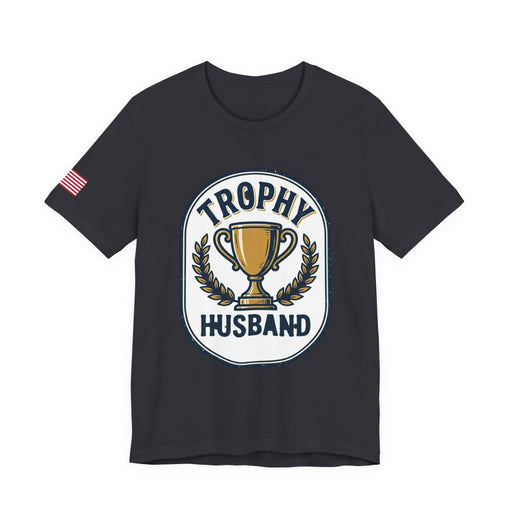 Black t-shirt with 'Trophy Husband' graphic design on a white background