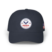All navy blue classic ball cap with a circular emblem featuring an eagle and text , along with the American flag on the side on a white background.