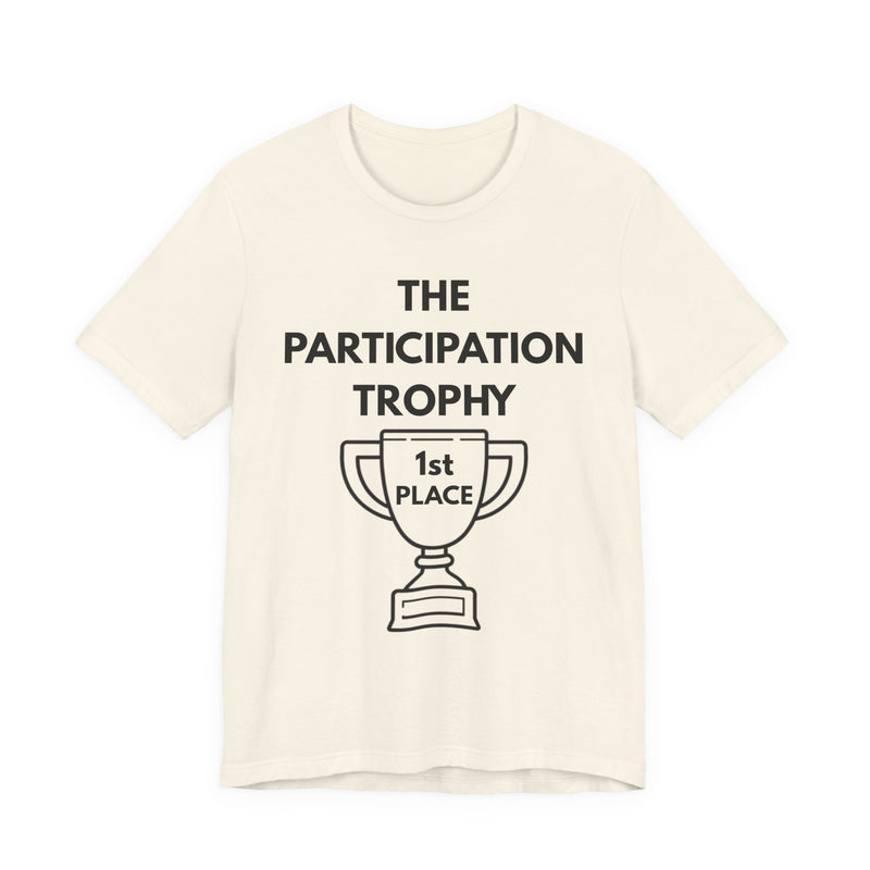 Beige t-shirt with 'The Participation Trophy 1st Place' text and graphic on a white background