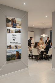 Custom matte photo banner with six family photos and center panel for name, age, and date hanging above a party table, 36x96 inches.
