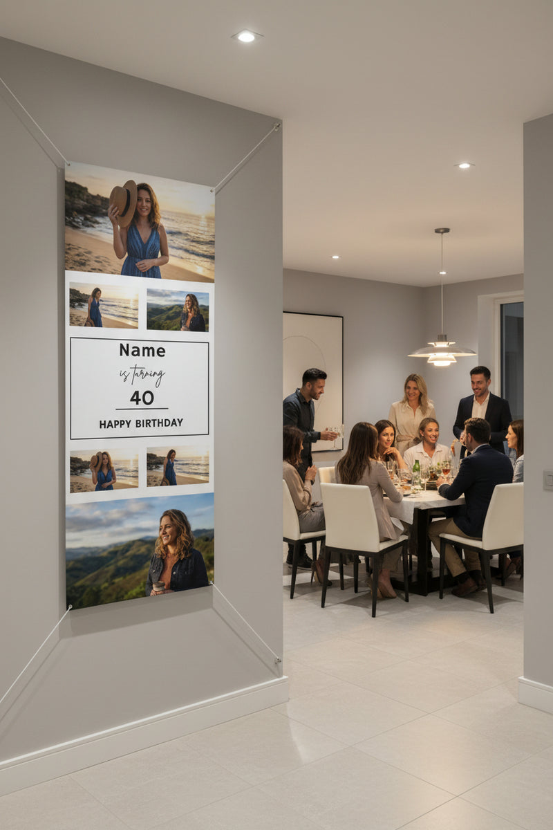 Custom matte photo banner with six family photos and center panel for name, age, and date hanging above a party table, 36x96 inches.