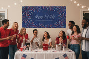 Custom patriotic “Happy 4th of July” matte banner with blue stripes and red and blue stars hanging above a party table, 48x24 and 72x36 inches.