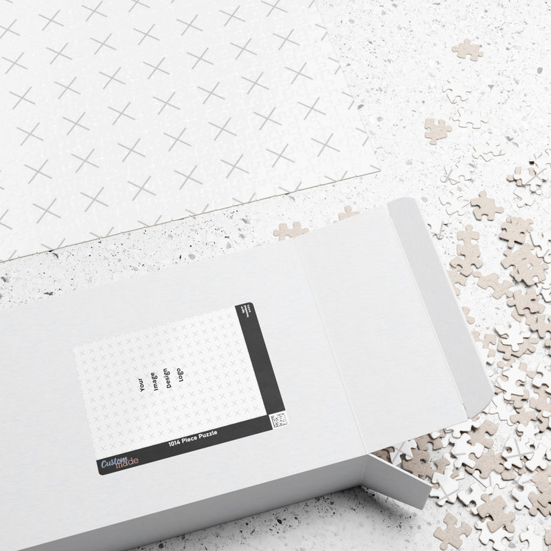 A customizable puzzle that has pieces scattered coming out of a box  on a white background.