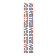 Table runner with 'USA' in red white and blue repeated on a white background. 