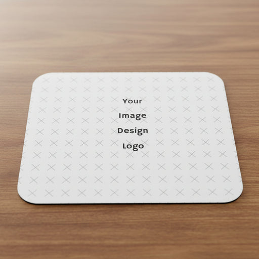Customizable white mouse pad with "your image or design" placeholder on a wood desk. 