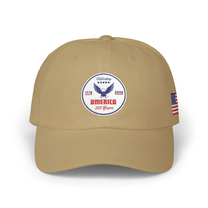 All khaki classic ball cap with a circular emblem featuring an eagle and text , along with the American flag on the side on a white background.