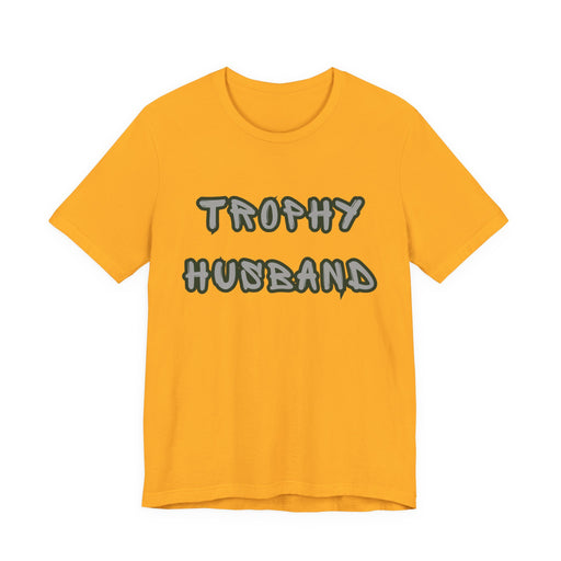Yellow t-shirt with 'Trophy Husband' text on a white background