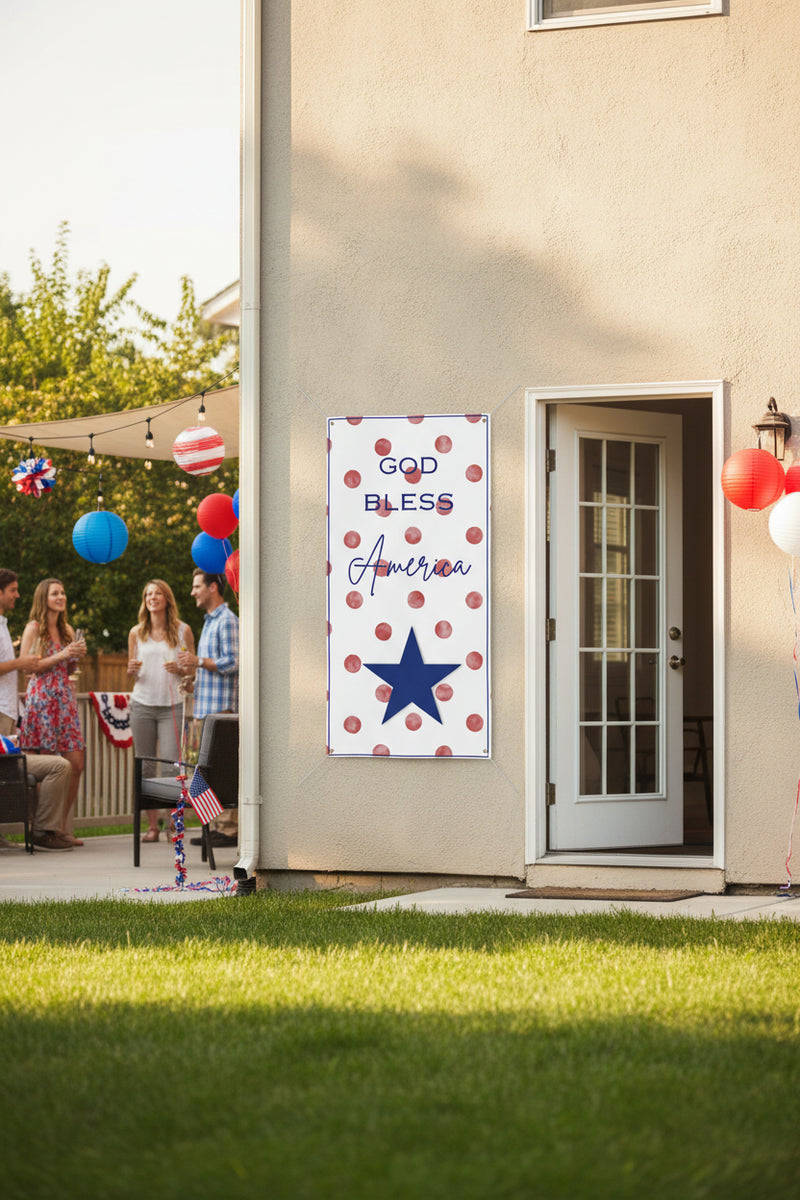 Patriotic “God Bless America” matte banner with red polka dot background hanging on back of house, 72x36 and 48x24 inches.