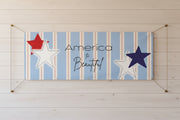 Patriotic “America the Beautiful” matte banner with blue stripes and red and blue stars, 96x36 inches