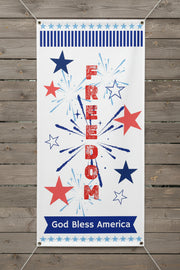 Patriotic vinyl banner with red white and blue stars, fireworks and the word freedom 24x48 and 36x72 inches on wood fence. 