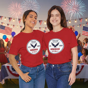 Two people wearing red t-shirts with a 'Celebrating America 250 Years' design  displayed in front of a party.