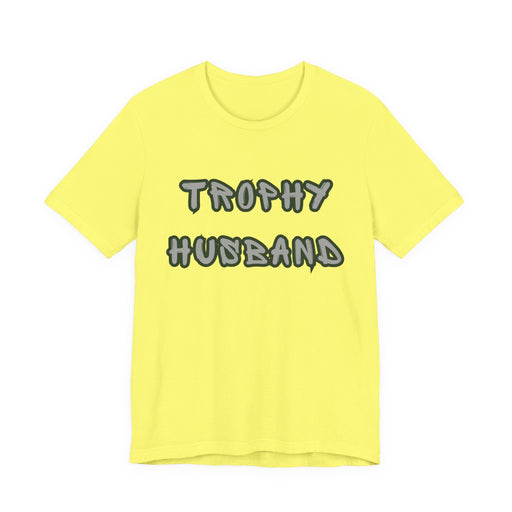 Yellow t-shirt with 'Trophy Husband' text on a white background