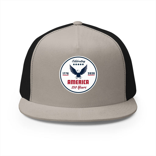 Stone and black flat bill trucker cap with a logo 'celebrating America 250 years' on a white background.