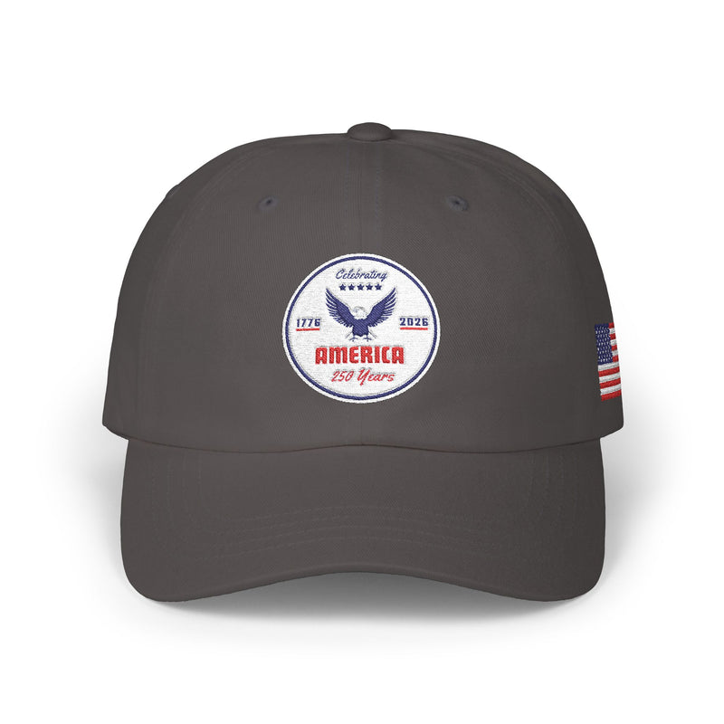All grey classic ball cap with a circular emblem featuring an eagle and text , along with the American flag on the side on a white background.